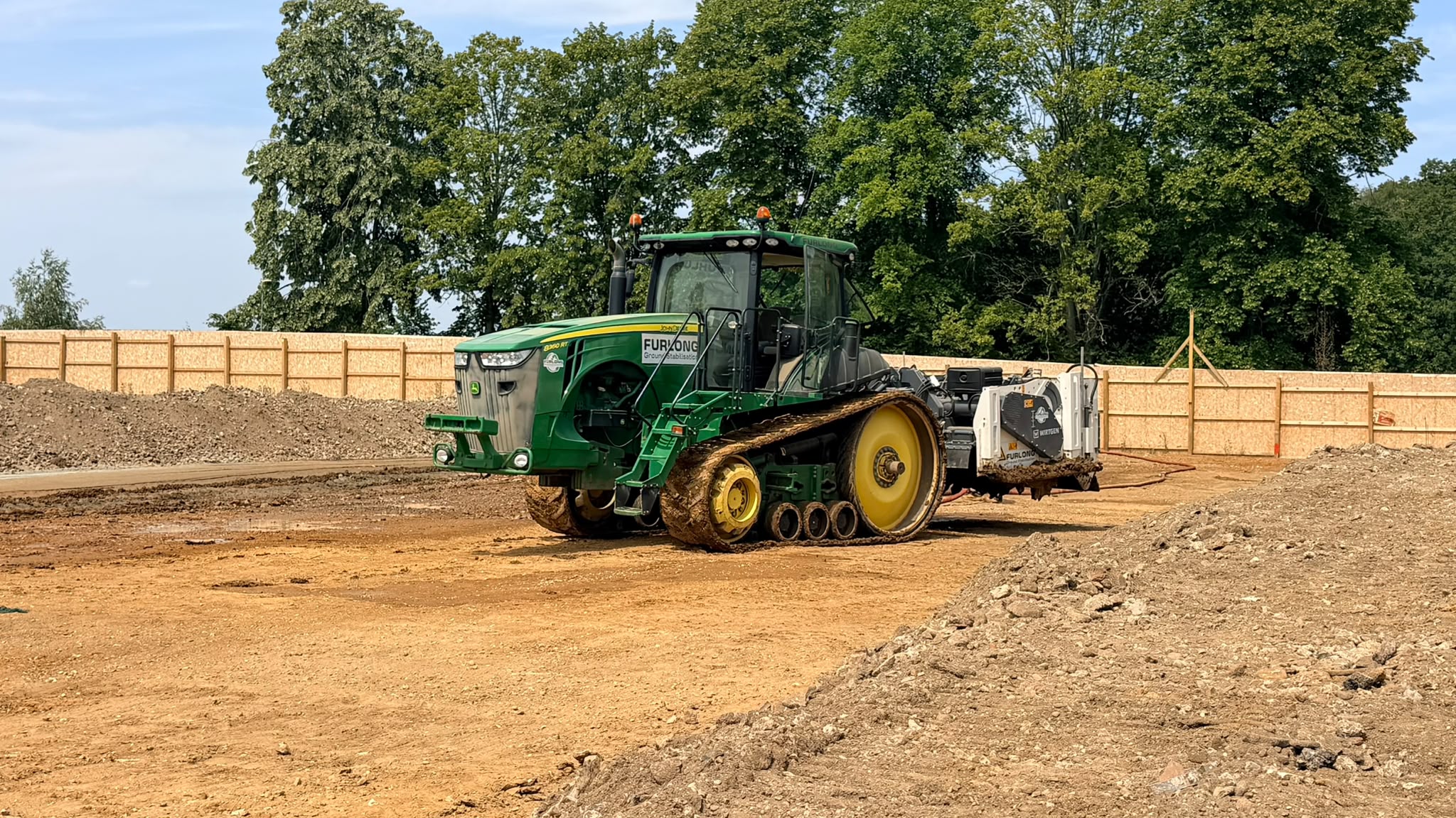 Tracked stabilisation mixer working on treated ground